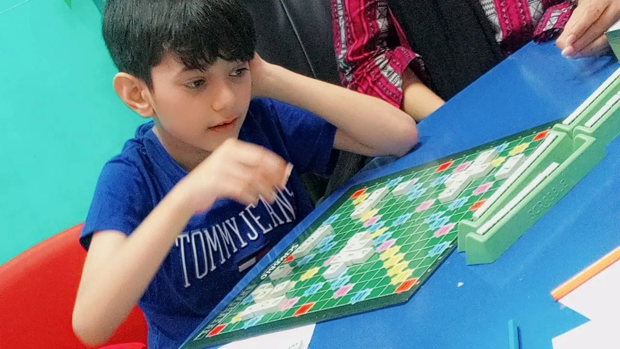 A student working through a word puzzle during a critical-thinking session